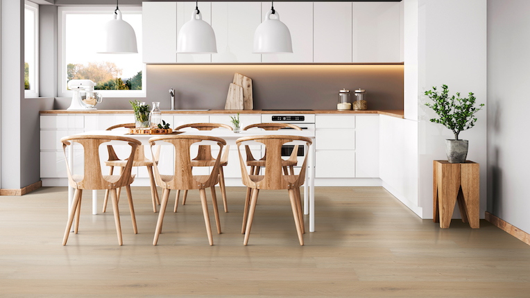 Luxury Vinyl flooring within a kitchen with brown wooden chairs and a white table